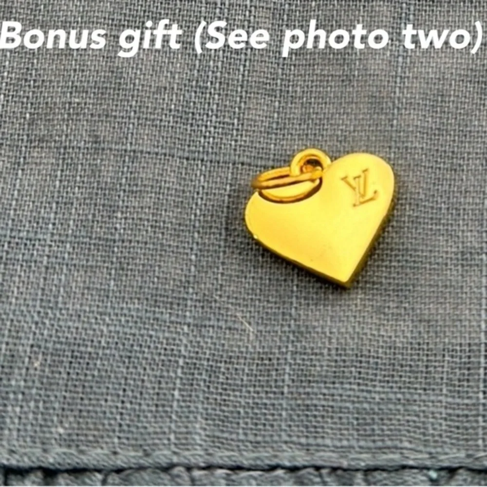 Louis Vuitton charm w/bonus gift. AUTHENTIC.